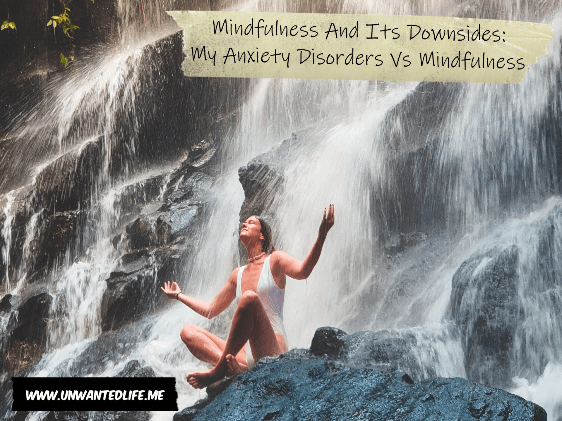 A woman sitting near a waterfall meditating with the title of the article (Mindfulness And Its Downsides: My Anxiety Disorders Vs Mindfulness) above her