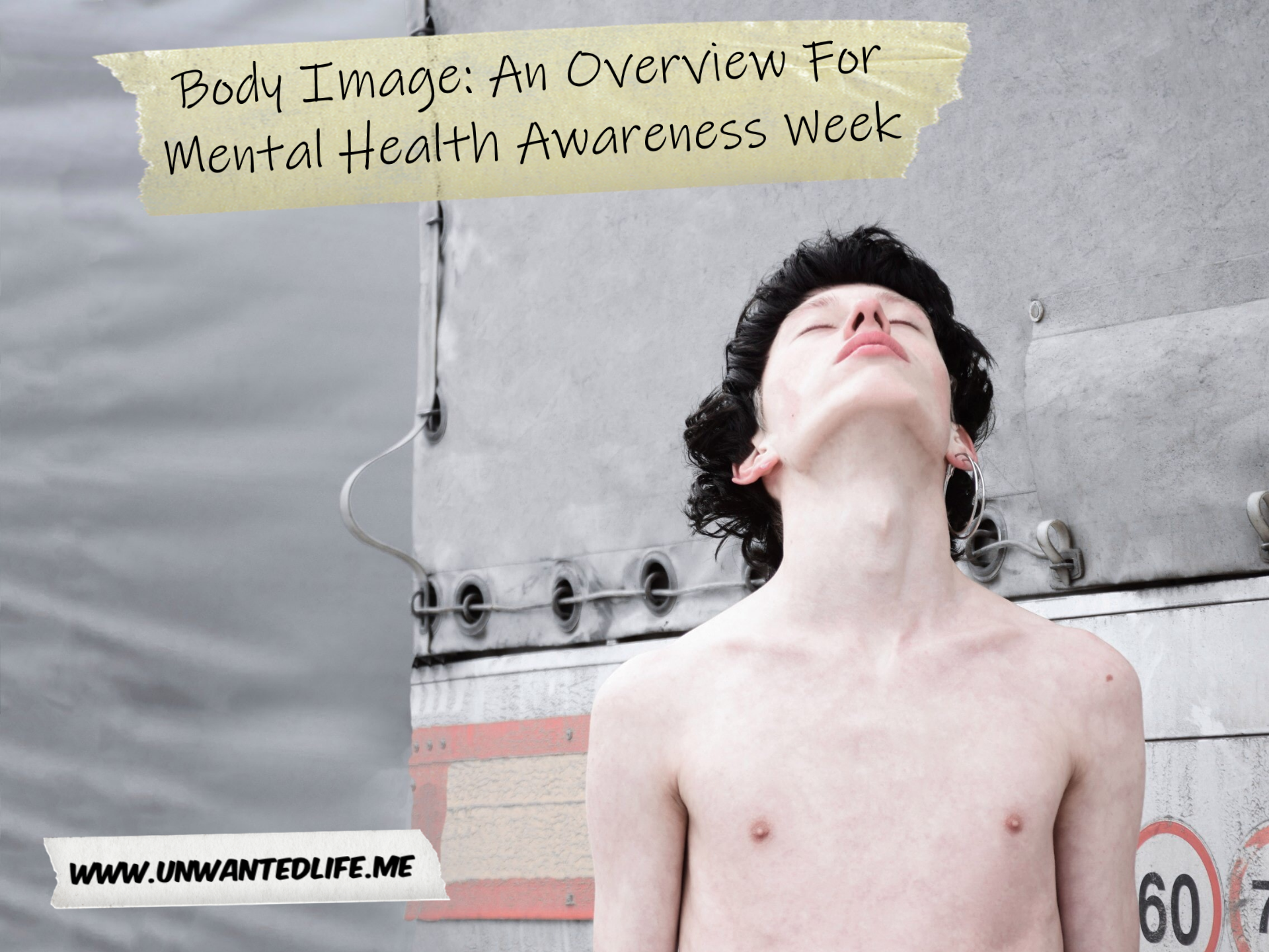 A photo of a skinny white man standing behind a lorry with the title of the article - Body Image: An Overview For Mental Health Awareness Week - across the top of the photo