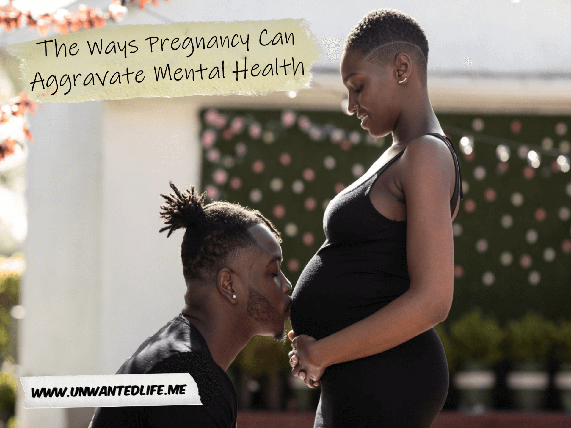 A black man kissing his pregnant partners pregnancy bump outside with the title of the article - The Ways Pregnancy Can Aggravate Mental Health - in the top right corner