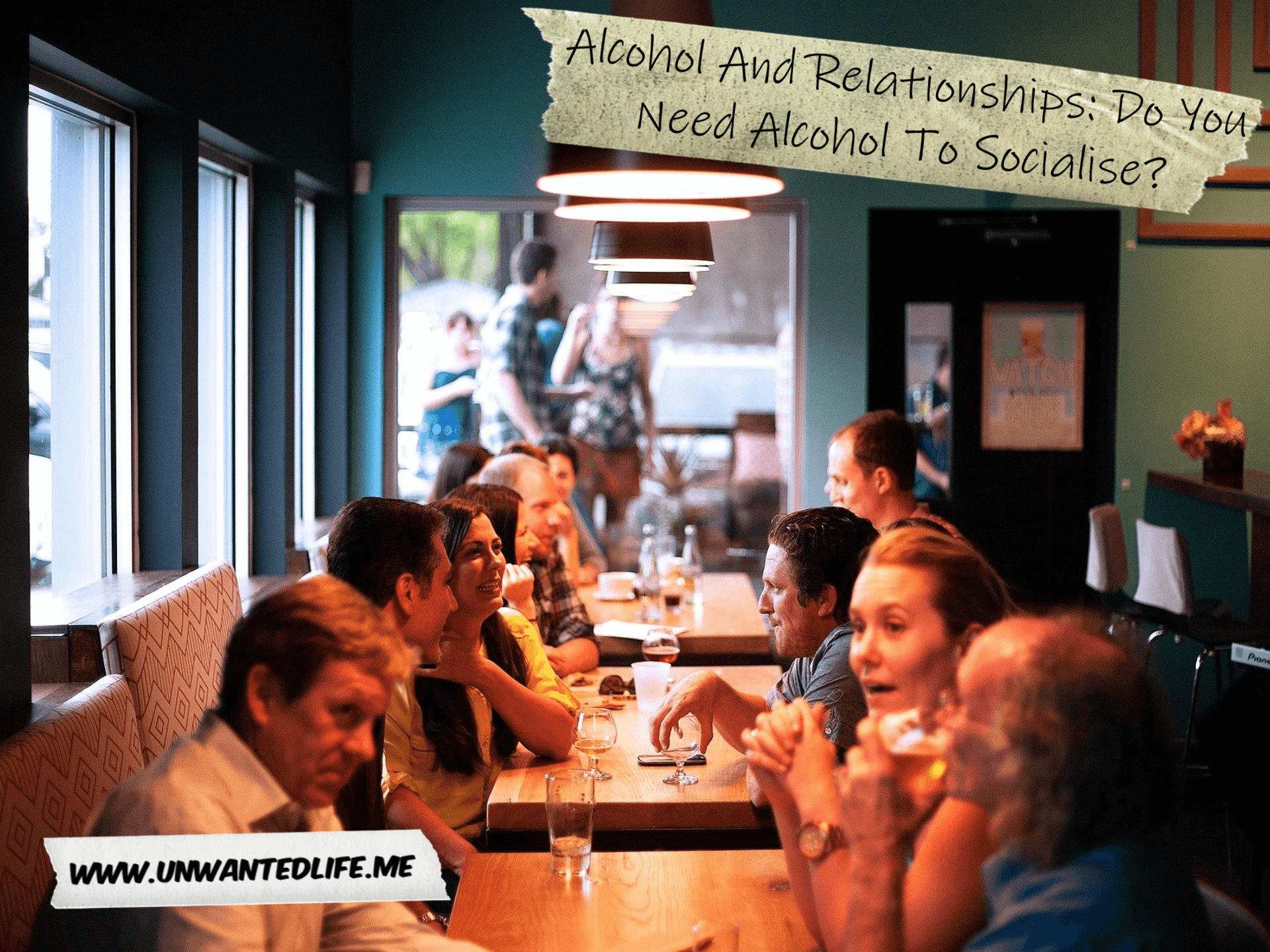 A photo of people sitting down at a pub drinking to represent the topic of the article - Alcohol And Relationships: Do You Need Alcohol To Socialise?