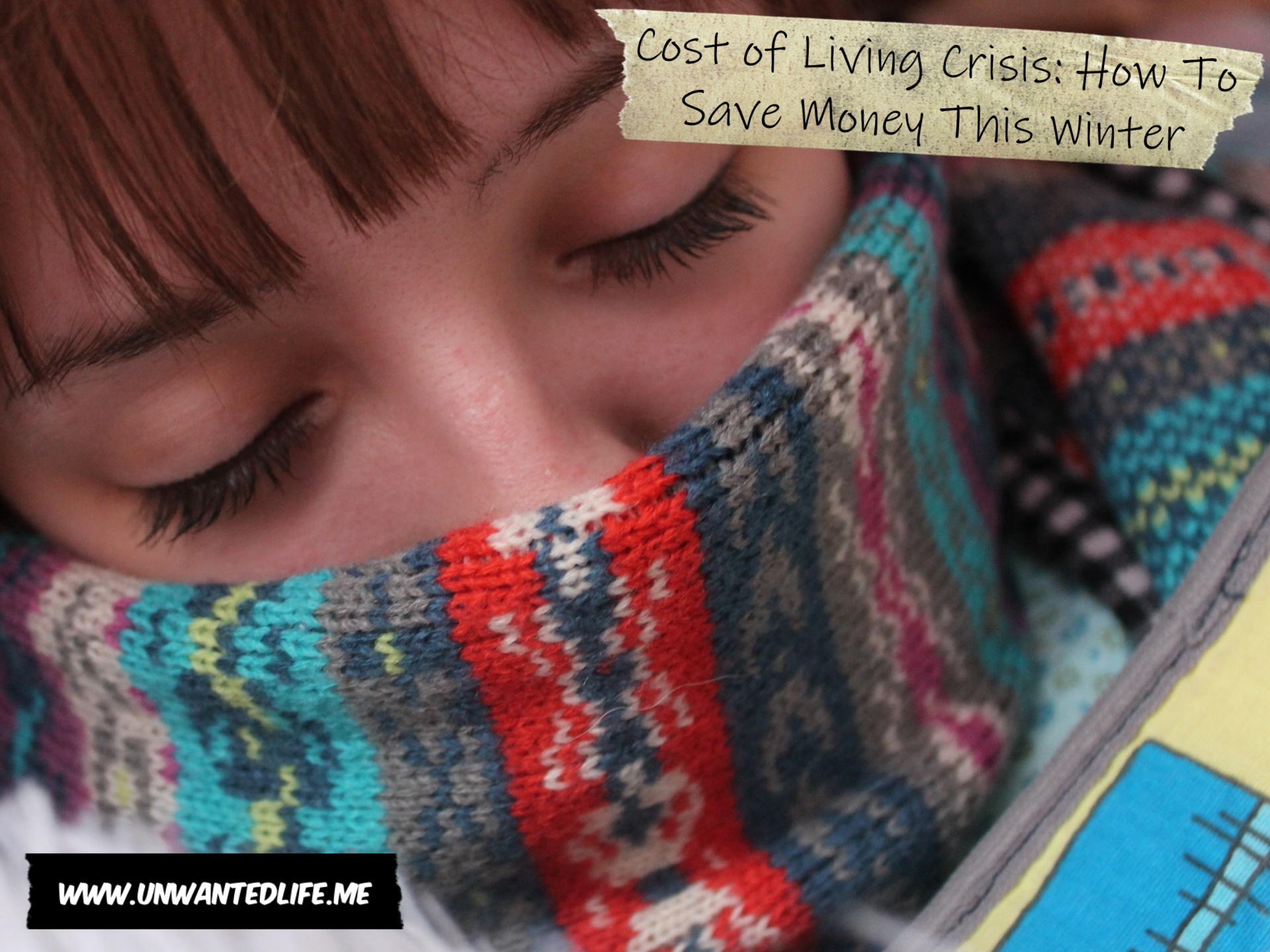 A close-up photo of a White woman wrapped up in a colourful scarf to represent the topic of the article - Cost of Living Crisis: How To Save Money This Winter