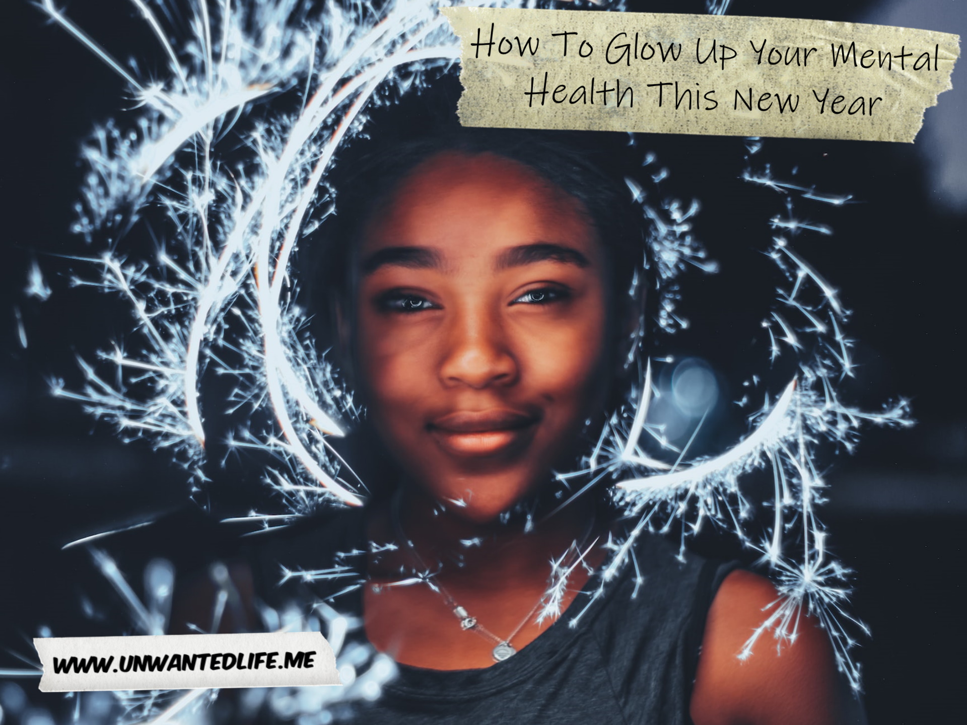 A photo of a Black woman outlined by a sparkler trace effect, to represent the topic of the article - How To Glow Up Your Mental Health This New Year