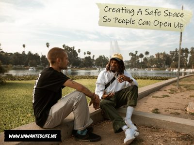 A photo of a Black guy and another guy sitting down talking to represent the topic of the article - Creating A Safe Space So People Can Open Up