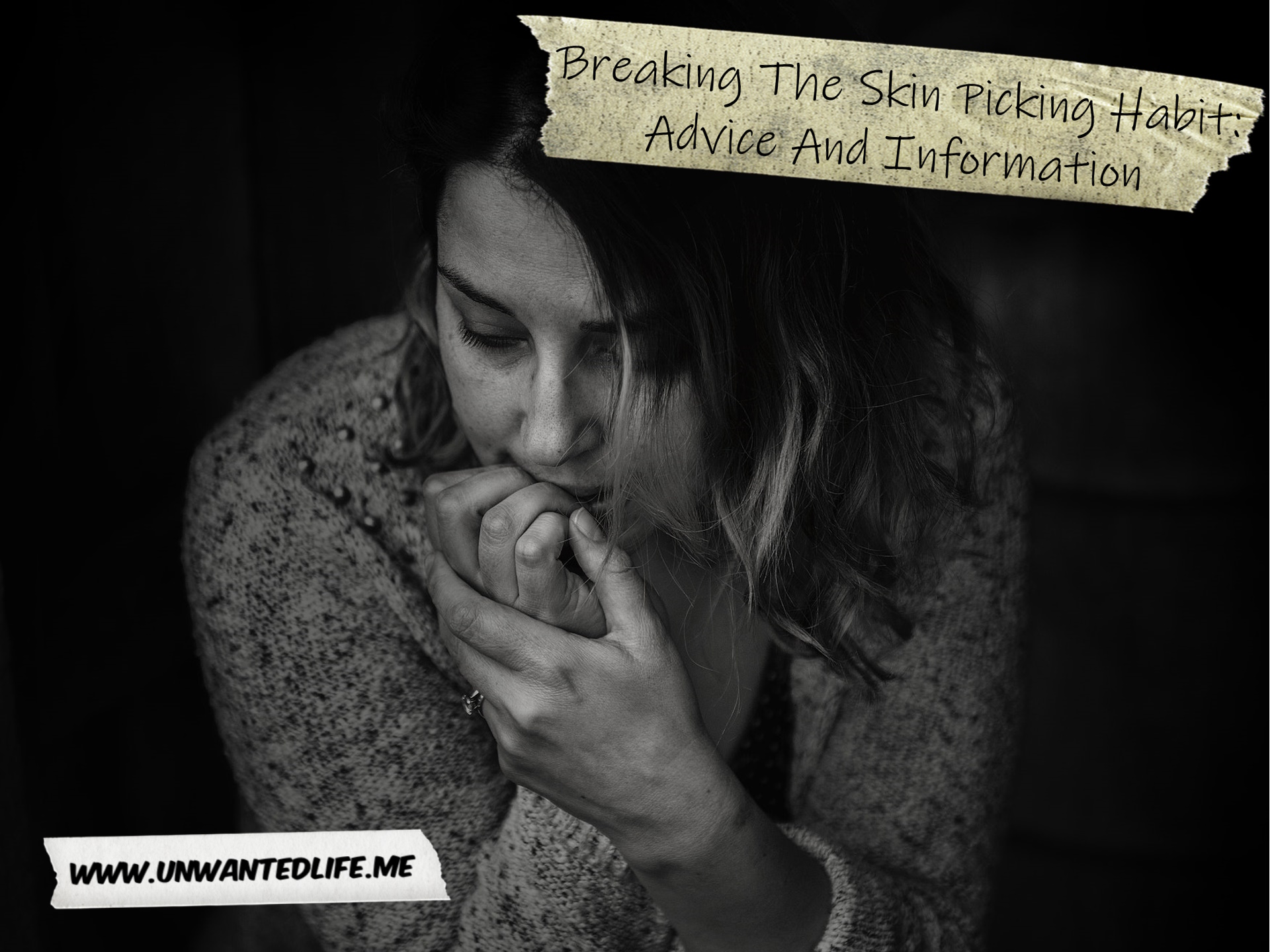 A black-and-white photo of a White woman stressed and biting her fingernails and surrounding skin to represent the topic of the article - Breaking The Skin Picking Habit: Advice And Information