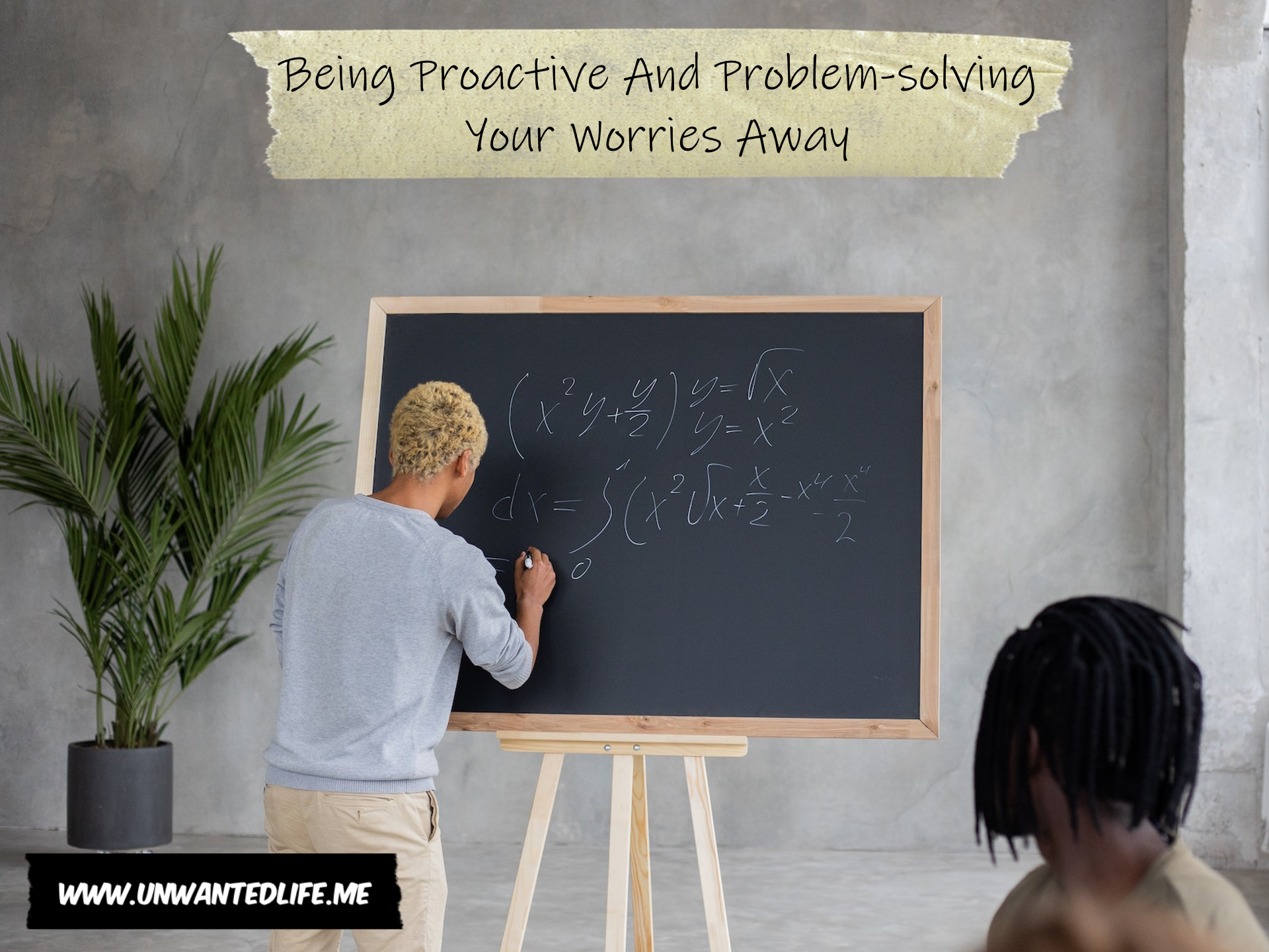 A person of mixed ethnicity writing a formula on a chalkboard to represent the topic of the article - Being Proactive And Problem-solving Your Worries Away