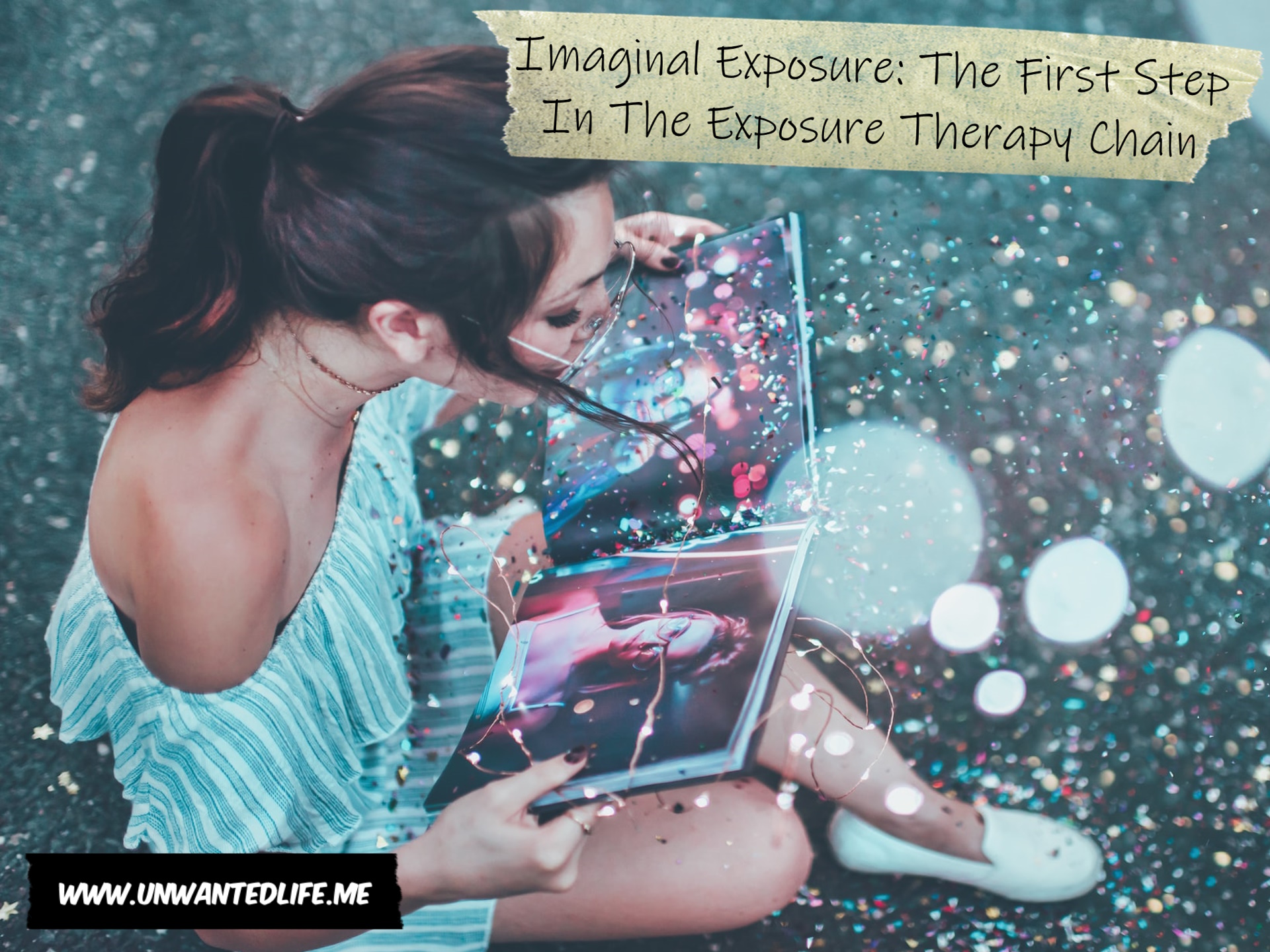 A photo of a woman looking through a photo book with glitter everywhere to represent the topic of the article - Imaginal Exposure: The First Step In The Exposure Therapy Chain