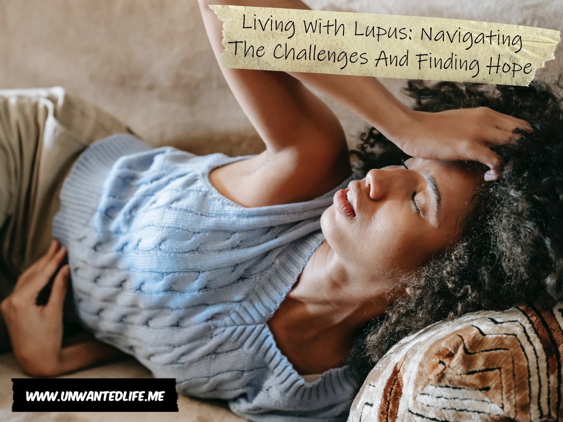An image being of a Black woman lying on the sofa nursing a headache to represent the topic of the article - Living With Lupus: Navigating The Challenges And Finding Hope