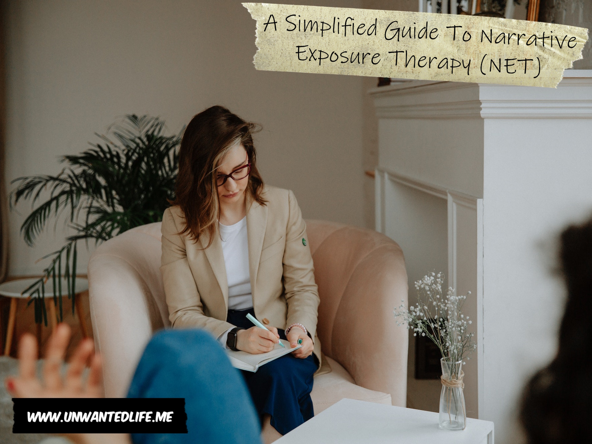A photo of a White therapist with their client in a session, where you see the therapist making notes to represent the topic of the article - A Simplified Guide To Narrative Exposure Therapy (NET)