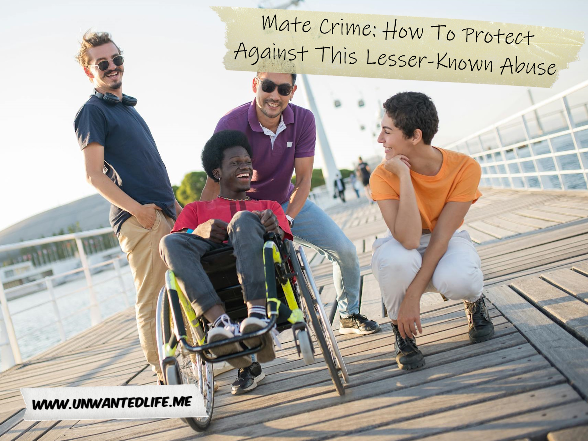 A photo of a Black man in a wheelchair with three White male friends who are tipping his wheelchair, to represent the topic of the article - Mate Crime: How To Protect Against This Lesser-Known Abuse