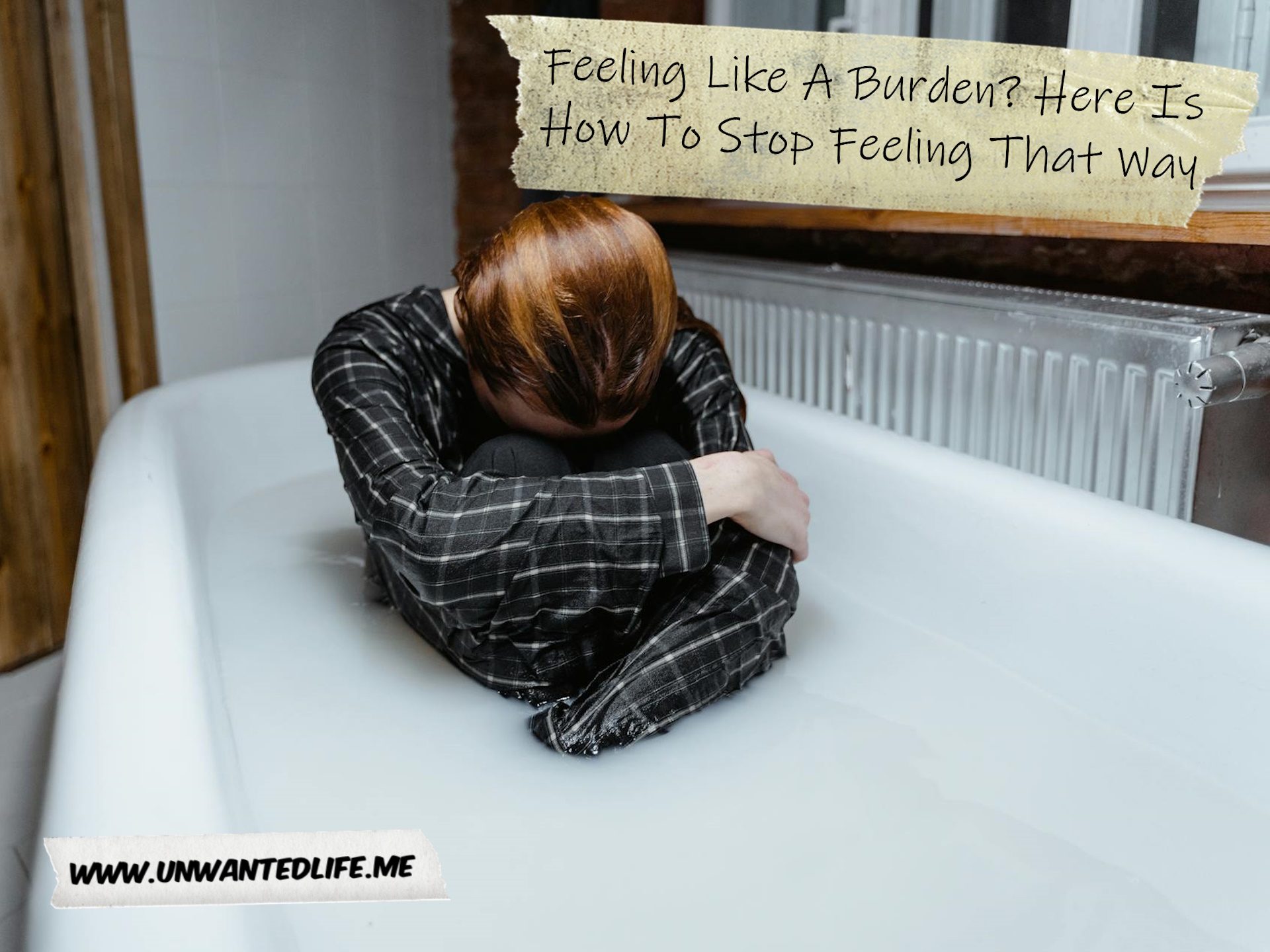 A woman wearing PJs sitting curled up in a bathtub full of water to represent the topic of the article - Feeling Like A Burden? Here Is How To Stop Feeling That Way