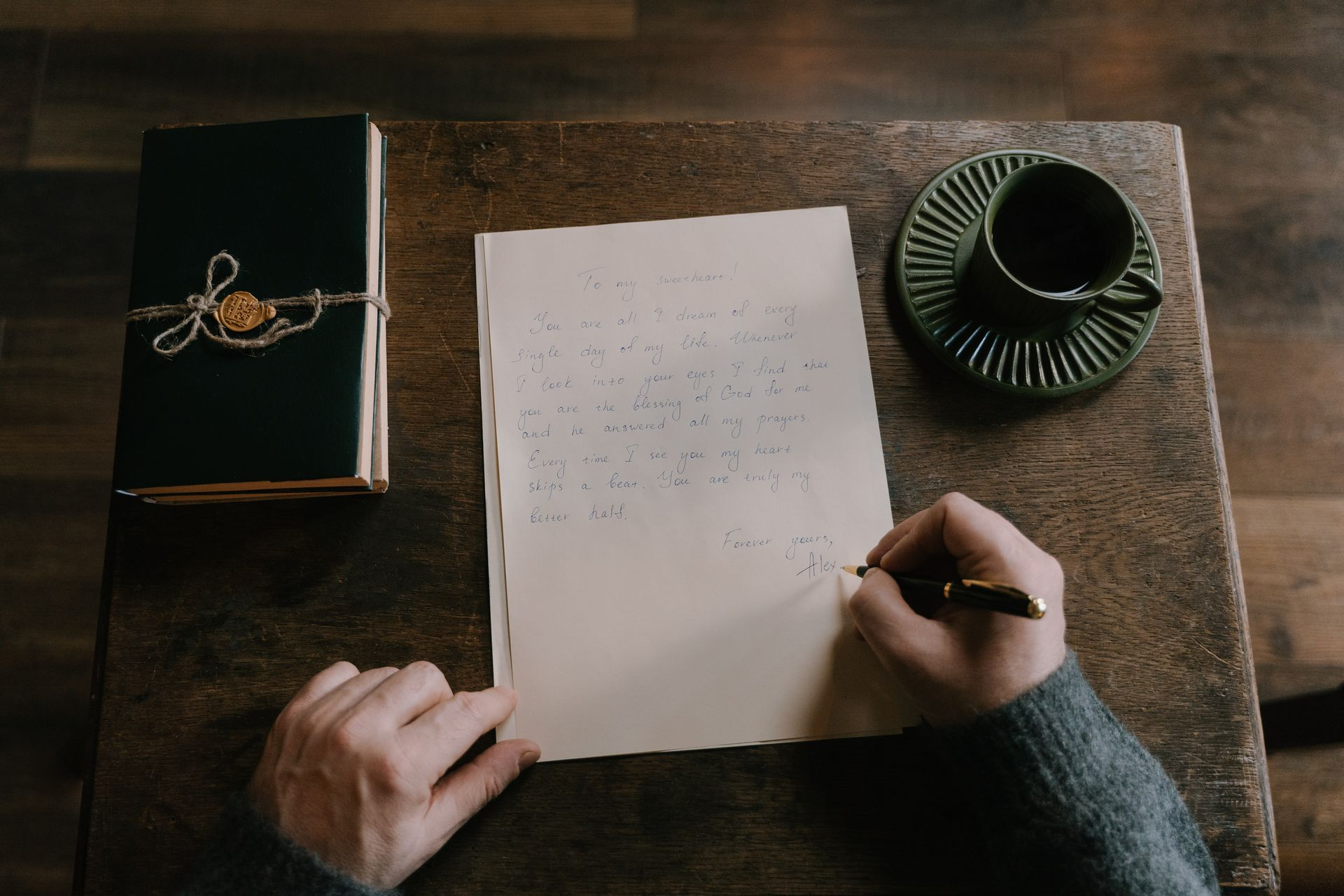 A person writing a letter to represent the topic of the article - The First Time I Ever Considered Writing A Suicide Letter
