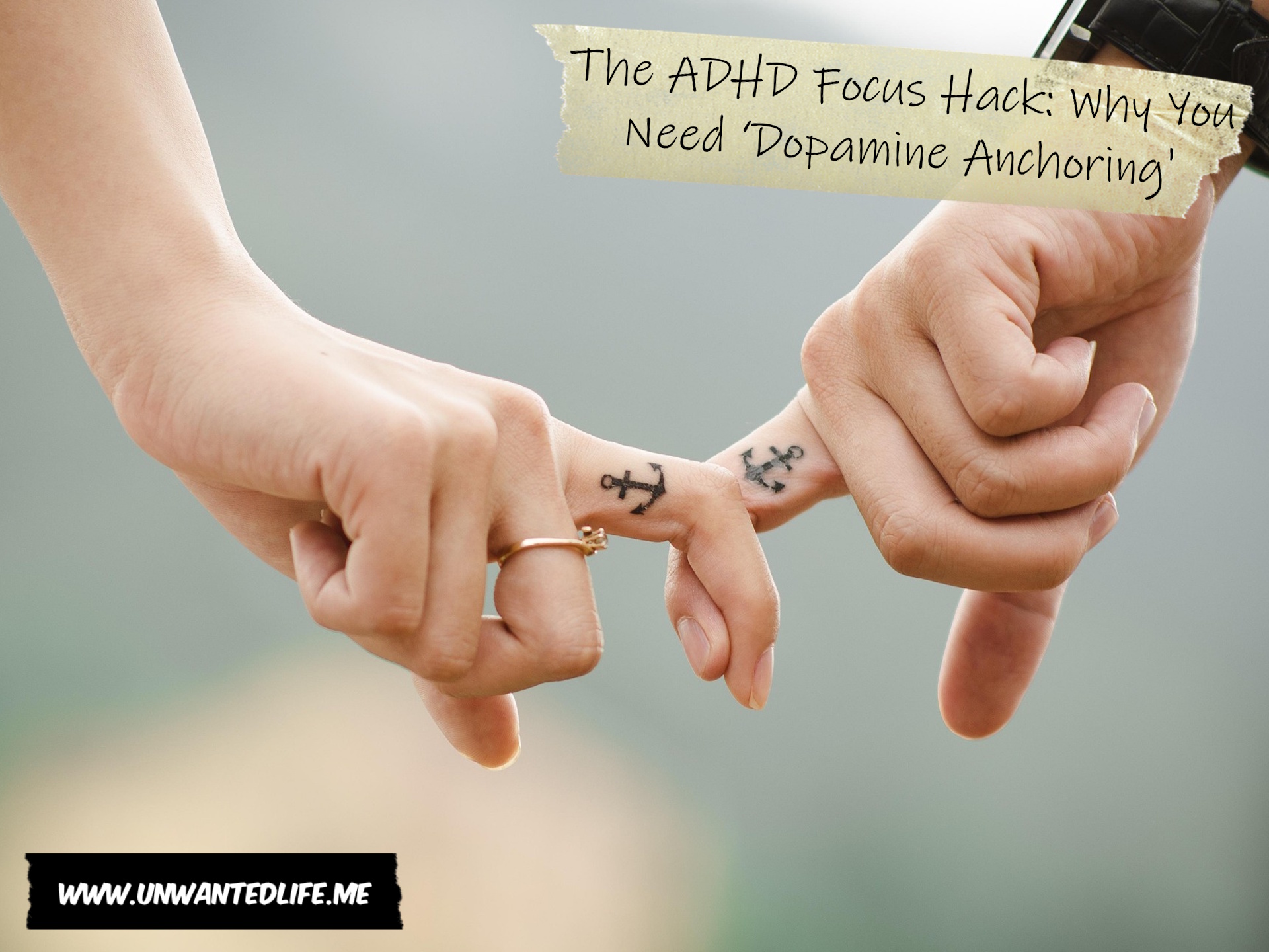 A photo of a two people holding hands via fingers that both have a tattoo of an anchor on it to represent the topic of the article - The ADHD Focus Hack: Why You Need ‘Dopamine Anchoring'