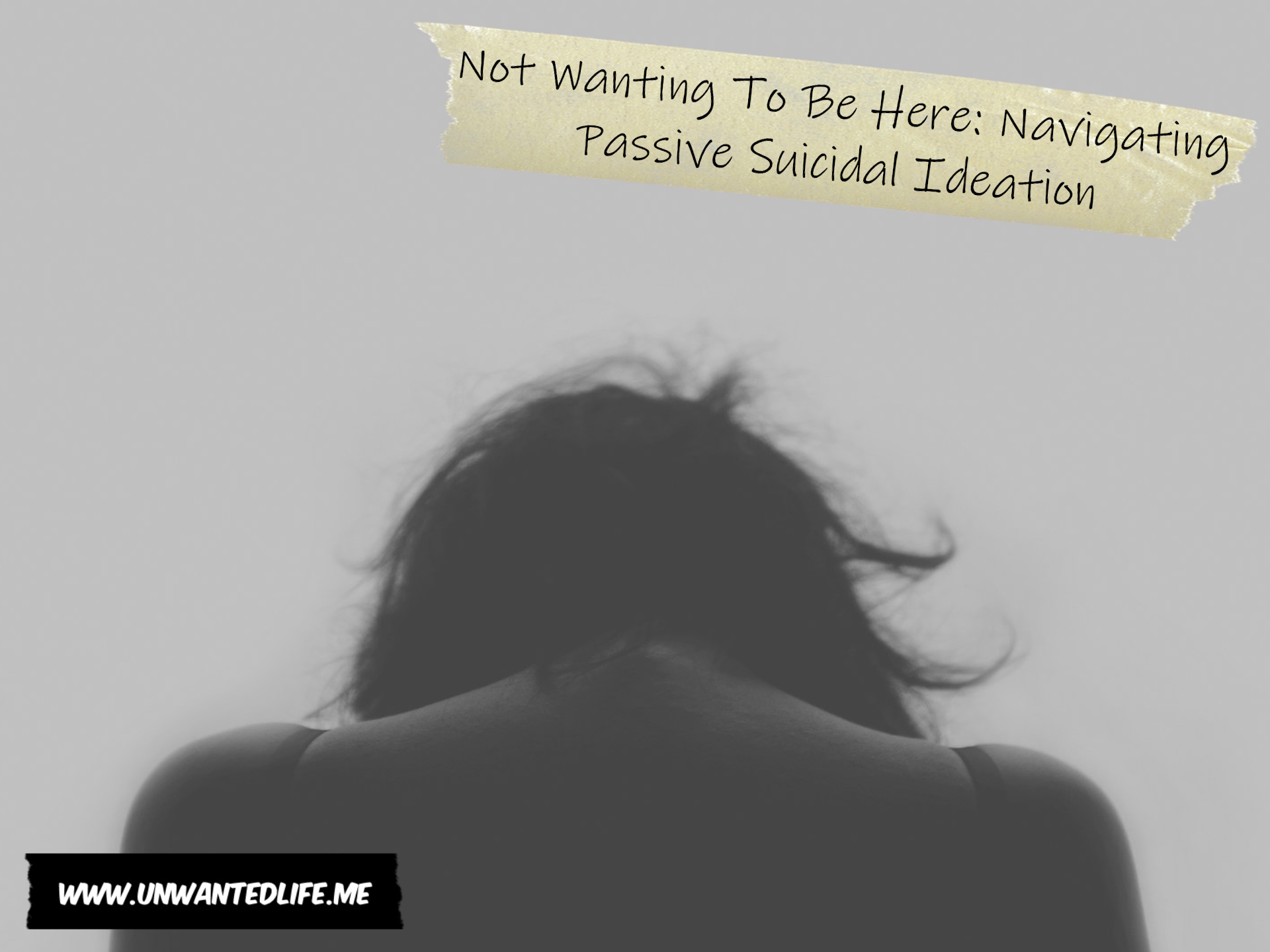 A photo from behind of a depressed woman to represent the topic of the article - Not Wanting To Be Here: Navigating Passive Suicidal Ideation
