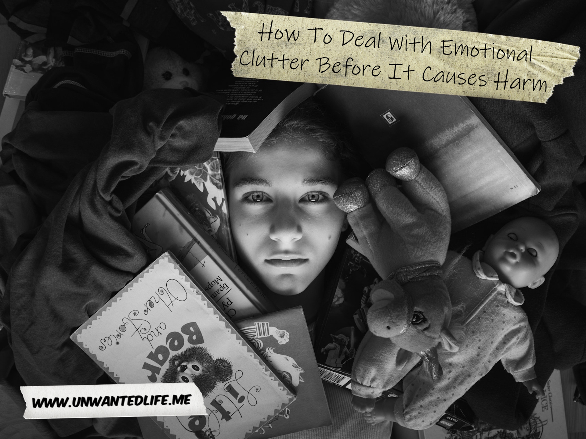 A photo of a person laying down with clutter spread across them to represent the topic of the article - How To Deal With Emotional Clutter Before It Causes Harm