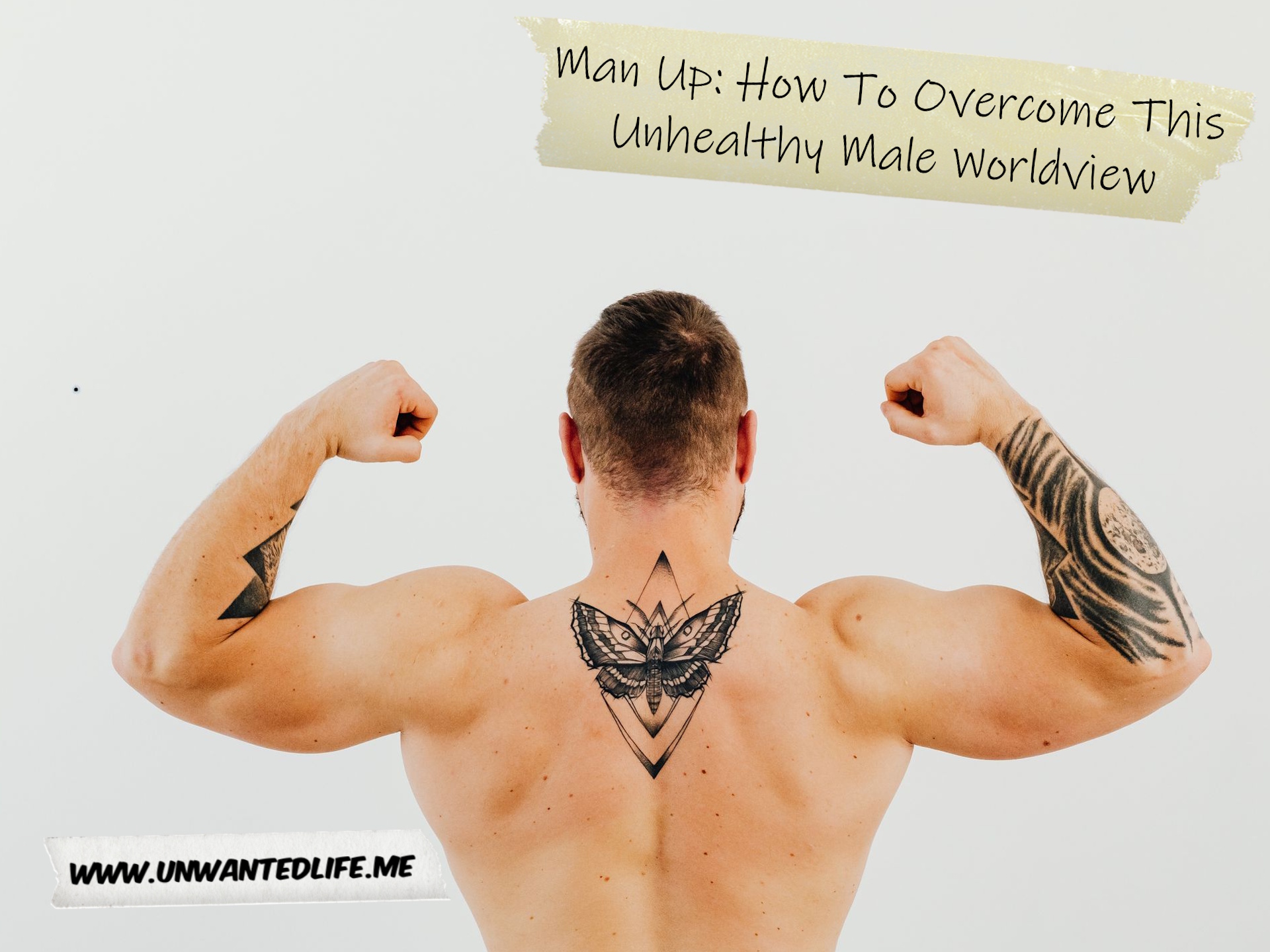 A photo of the back of a White man with tattoos flexing their muscles to represent the topic of this article - Man Up: How To Overcome This Unhealthy Male Worldview