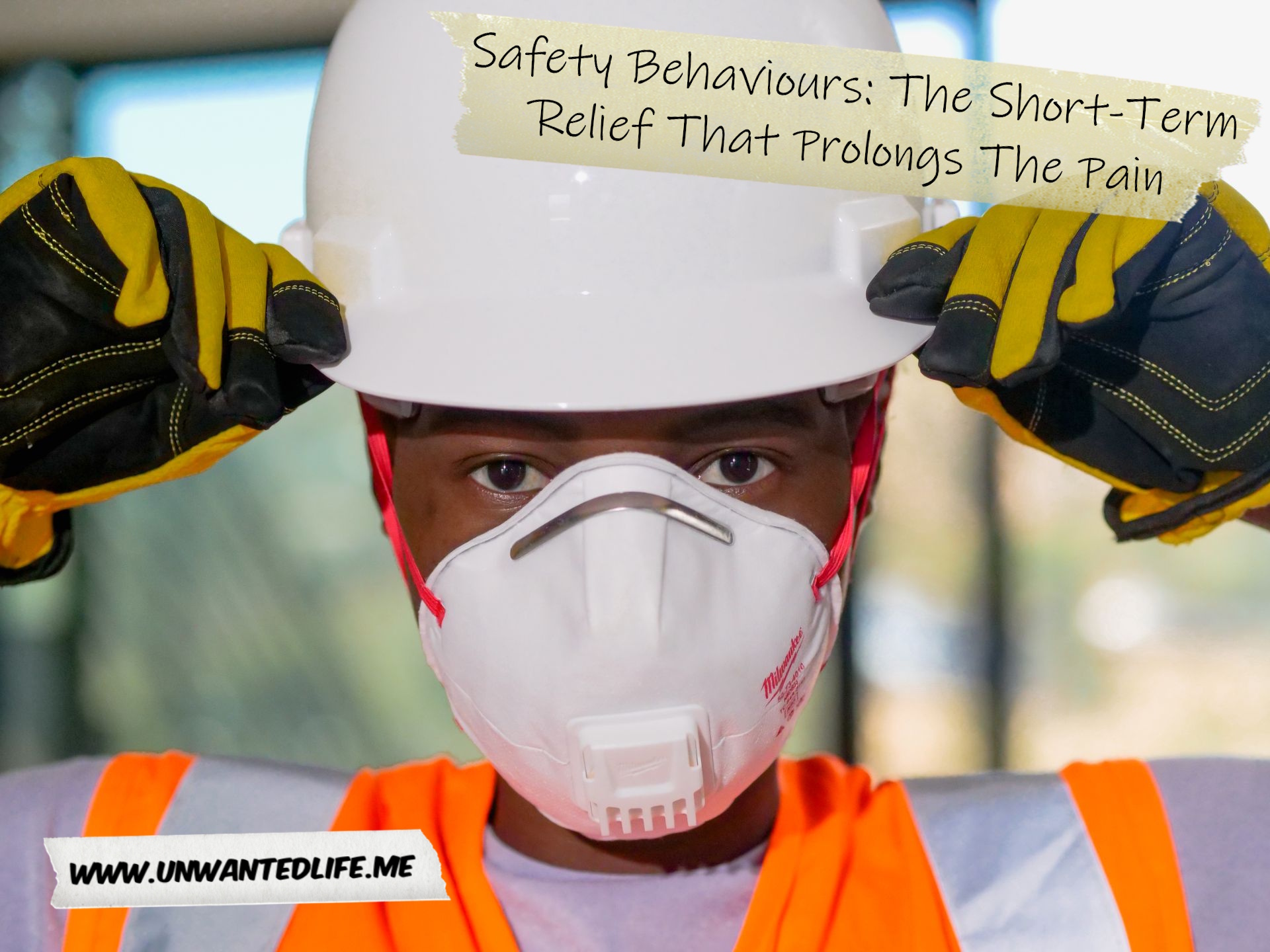 A Black person in hard hat, mask, and safety jacket to represent the topic of the article - Safety Behaviours: The Short-Term Relief That Prolongs The Pain